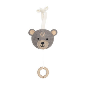 Peluche musicale ourson en tricot 