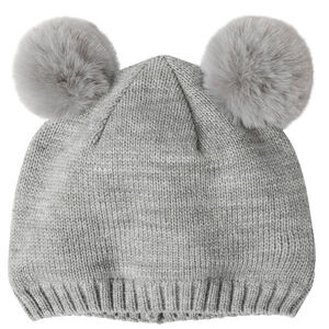 Bonnet en tricot et pompons en fausse fourrure 